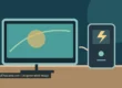 AI-created illustration of a desktop computer monitor connected by a cable to a UPS battery backup unit with a lightning symbol on a desk, not a specific product
