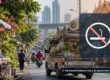Bangkok street scene with no-smoking symbol illustrating smoking restrictions in nightlife venues